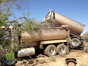 Driver crashes tandem dump truck NW of Tucson